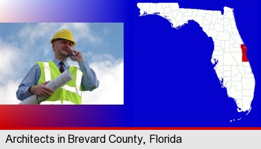 an architect with blueprints, conversing on a cellular phone; Brevard County highlighted in red on a map